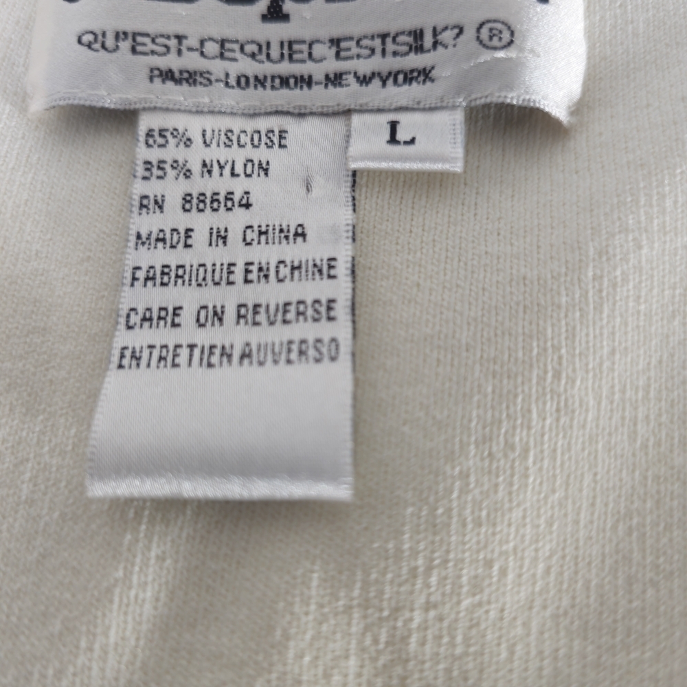 Joseph A. It is a knit garment distinguished by a floral and mirror design. - Picture 13 of 13